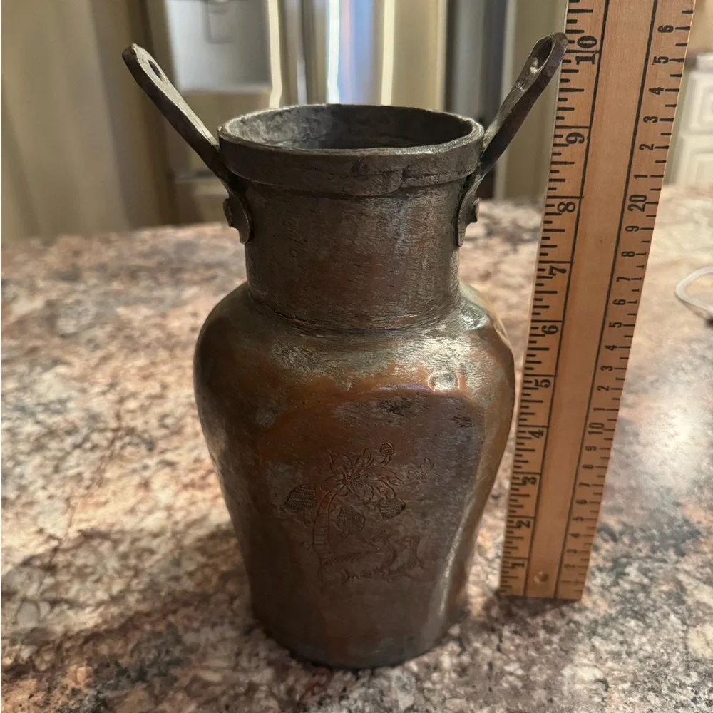 vintage collectible is a hand-hammered Turkish copper vessel